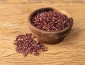 Azuki beans in a bowl over wooden table Royalty Free Stock Photo