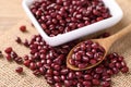 Azuki beans or red mung beans in a wooden spoon and bowl Royalty Free Stock Photo