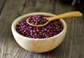 Azuki beans in wood bowl on table