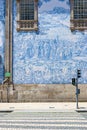 Azulejo tile in Porto, Portugal. Traditional portuguese ceramic decoration blue color. Historic building wall facade Royalty Free Stock Photo