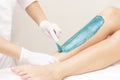 Azulene depilation. wax hair removal, shugaring. concept of smooth skin without hair. azulene of green color