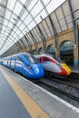 Azuma high speed trains of London North Eastern Railway LNER and Lumo of FirstGroup at King\'s Cross train station Royalty Free Stock Photo