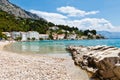 Azure Adriatic Bay and Rocky Breakwater Royalty Free Stock Photo