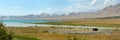 Azure blue lake in Jalalabad, Kyrgyzstan. Royalty Free Stock Photo