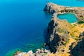 Azure heart shaped sea bay in Lindos, Rhodes, Greece Royalty Free Stock Photo