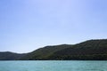 Azure lake against the backdrop of mountains Royalty Free Stock Photo