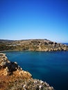 Azure water at romantic Ghajn Tuffieha Bay at Malta