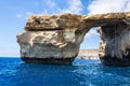 Azure Window in Gozo in blue summer waters