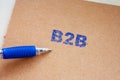 The B2B inscription on note. Word B2B on paper message concept