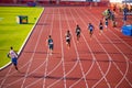 Men Sprinters Strive in 400m Race Bathed in Serene Sunset Ambiance on Track and Field