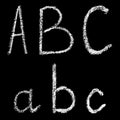 A, b, c handwritten white chalk letters isolated on black background