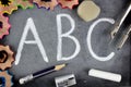 A B C letters and school stuff on blackboard Royalty Free Stock Photo