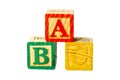 A, B and C wooden alphabet block isolate on a white background called ABC`s blocks uses for play in preschool as a toy Royalty Free Stock Photo