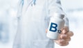 B12 Vitamin, B12 supplements for human health. Doctor recommends taking B12. doctor talks about Benefits of B. Essential vitamins Royalty Free Stock Photo