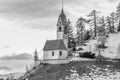 La valle La val dolomites mountain church in winter in black and white Royalty Free Stock Photo