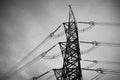B&W power line, high voltage Pole, High voltage tower sky background Royalty Free Stock Photo