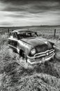 B&W of rusted antique car. Royalty Free Stock Photo