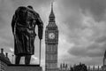 B&W Winston Churchill in parliament square and Big Ben in London, England