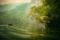 Ba Be lake, Bac Kan province, Vietnam - April 4, 2017 : tourists on the boat are going to enjoy and explore Ba Be lake.