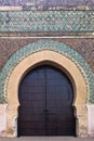 Bab Mansour Gate at El Hedime square, decorated with mosaic ceramic tiles, in Meknes, Morocco Royalty Free Stock Photo