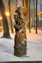 baba yaga wood sculpture with an owl in a city park russia