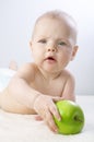 Babe and an apple #3 Royalty Free Stock Photo