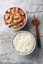 Babi Kecap Slow Braised Pork with Ginger, Chilli and Sweet soy sauce served with rice closeup. Vertical top view Royalty Free Stock Photo