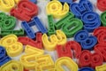 Early Childhood Education , Colorful plastic one to ten number sets in Red, Blue, Green and Yellow colors. in white background. Royalty Free Stock Photo