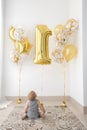 Babies` First Birthday One year old with balloons Royalty Free Stock Photo