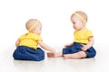 Babies Girls Twins, Two Kids Sitting on Floor, Children Sisters Royalty Free Stock Photo