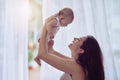 Babies, like a preview of heaven. a young woman bonding with her baby boy at home. Royalty Free Stock Photo