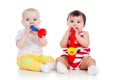 Babies play musical toys Royalty Free Stock Photo