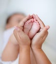 Babies are so precious. Cropped shot of a mother holding her baby. Royalty Free Stock Photo