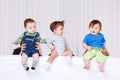 Babies sitting on the sofa back Royalty Free Stock Photo