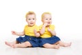 Babies Twins, Two Kids Girls Sitting on Floor, Sisters Children Royalty Free Stock Photo