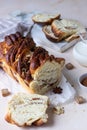 Babka or brioche bread with cinnamon and brown sugar. Homemade pastry for breakfast