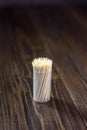 Babmoo dental tooth picks on a dark wooden table. Royalty Free Stock Photo