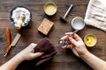 Babrer workplace with tools on wooden background top view