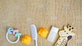 Baby accessories for bathing and toy on towel with copy space, flat lay Royalty Free Stock Photo