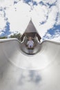 Baby adventurer on huge slide Royalty Free Stock Photo