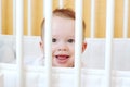 Baby age of 7 months in white bed Royalty Free Stock Photo