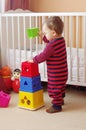 Baby age of 1 year plays nesting blocks