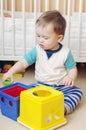 Baby age of 1 year plays toys at home Royalty Free Stock Photo