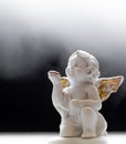 Baby Angel On Black And Misty Background 1 Royalty Free Stock Photo