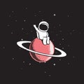 Baby astronaut sits on Saturn