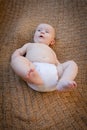 Baby On Back Wearing White Cloth Diaper Royalty Free Stock Photo