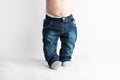 Baby in baggy jeans Royalty Free Stock Photo