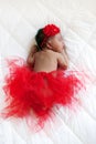 Baby ballerina. Black newborn sleeping