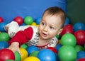 Baby in balls Royalty Free Stock Photo