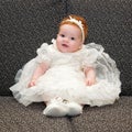 Baby in baptismal clothing Royalty Free Stock Photo